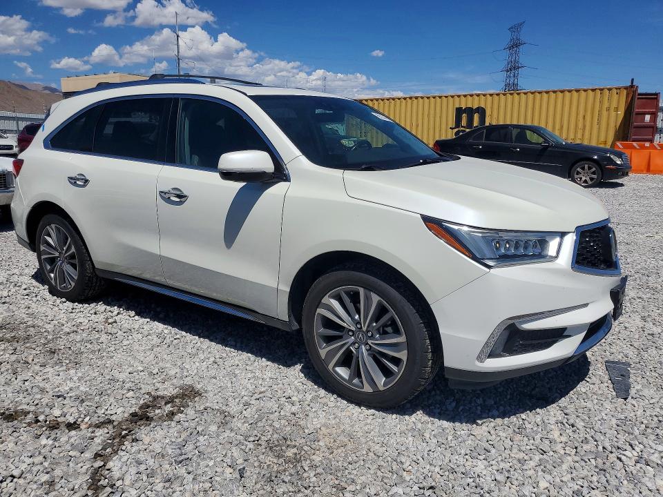 Photo 4 from auction – 2017 ACURA MDX with VIN 5FRYD4H52HB013374