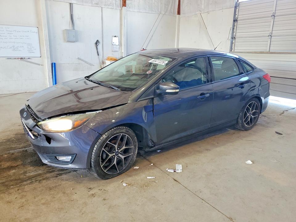 FORD FOCUS 2017 with VIN 1FADP3H2XHL248471 - Photo from auction