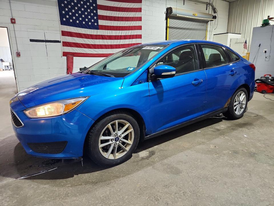 FORD FOCUS 2016 with VIN 1FADP3F23GL248118 - Photo from auction