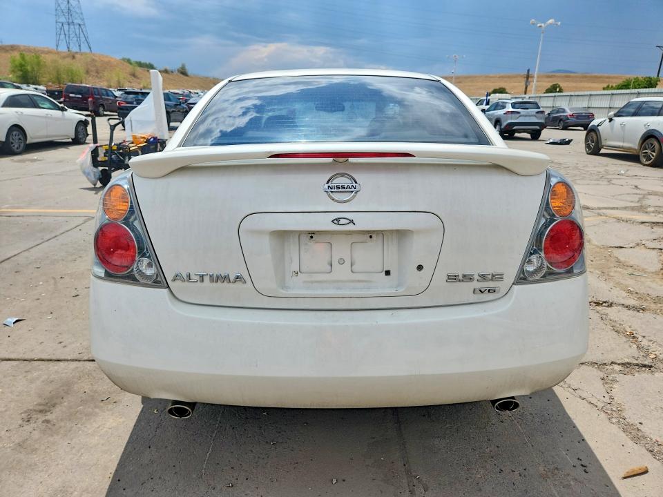 Photo 6 from auction – 2002 NISSAN ALTIMA with VIN 1N4BL11D02C161088