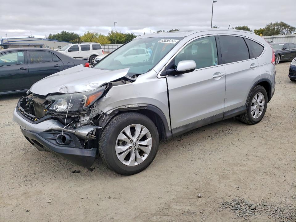 HONDA CR-V 2014 with VIN 2HKRM4H71EH608494 - Photo from auction