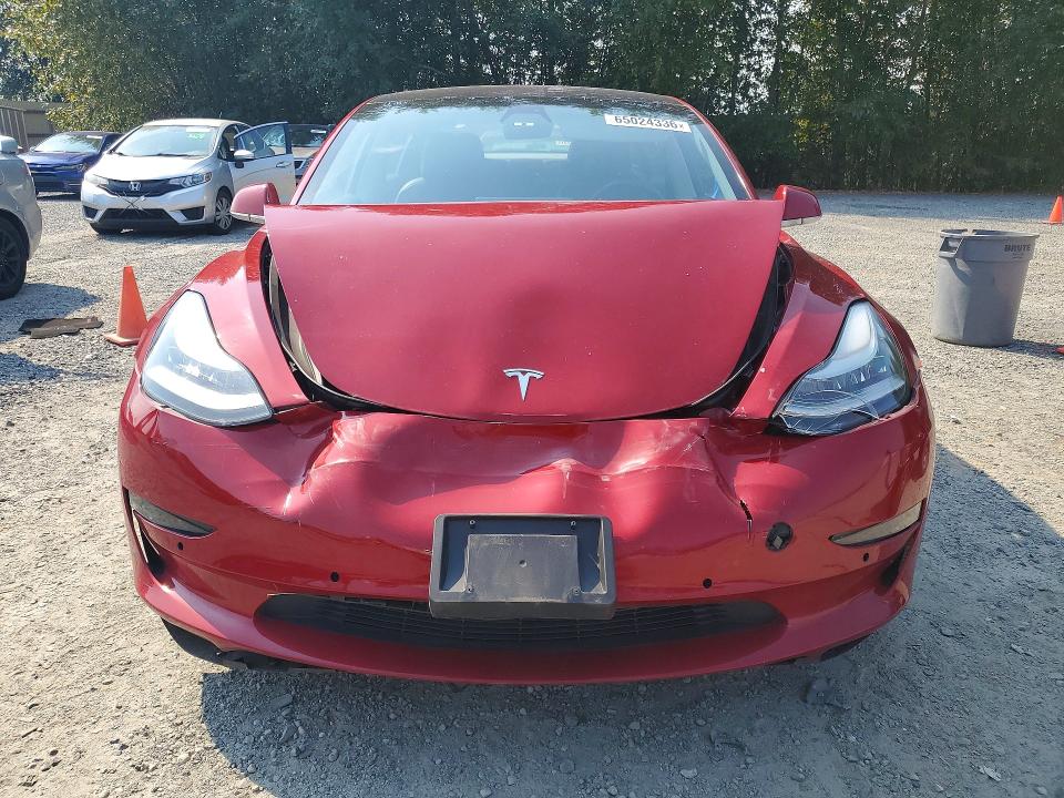 Photo 5 from auction – 2018 TESLA MODEL 3 with VIN 5YJ3E1EA0JF045707