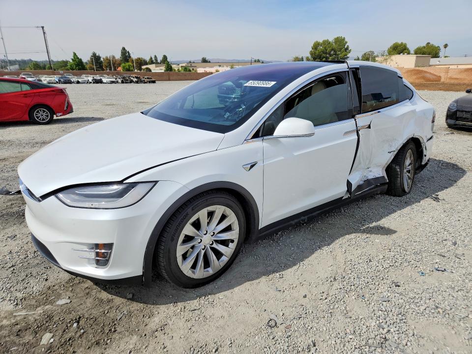 TESLA MODEL X 2021 with VIN 5YJXCDE21MF323679 - Photo from auction