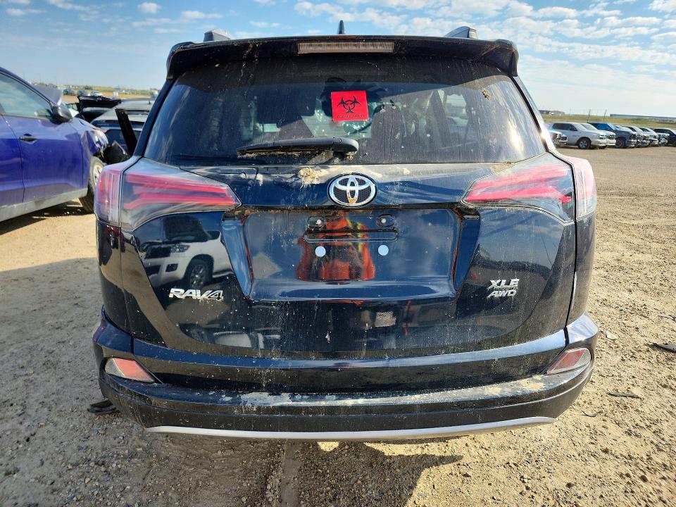 صورة رقم 6 من المزاد - 2018 TOYOTA RAV4 مع VIN 2T3RFREV8JW828700
