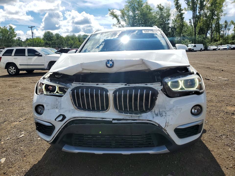 Photo 5 from auction – 2017 BMW X1 with VIN WBXHT3Z35H4A65557