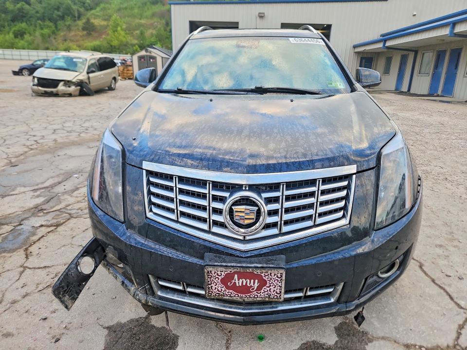Photo 5 from auction – 2014 CADILLAC SRX with VIN 3GYFNEE32ES517631