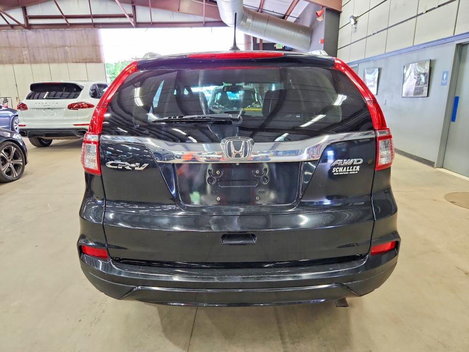 Photo 6 from auction – 2015 HONDA CR-V with VIN 5J6RM4H74FL101564
