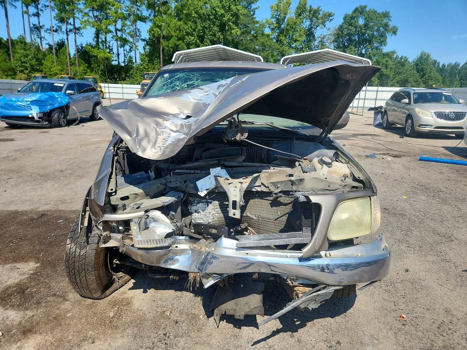 Photo 5 from auction – 2003 FORD F150 with VIN 1FTRW07L03KD28470