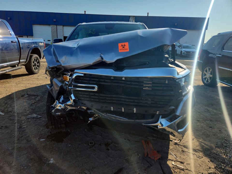 Photo 5 from auction – 2021 RAM 1500 with VIN 1C6SRFFT5MN579263