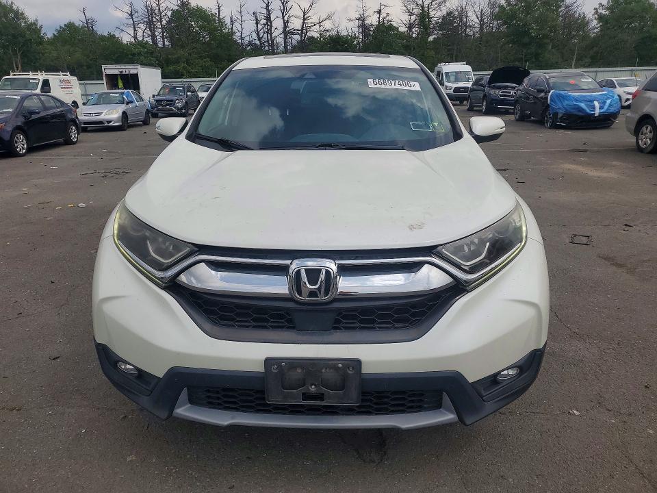 Photo 5 from auction – 2017 HONDA CR-V with VIN 2HKRW2H82HH611982