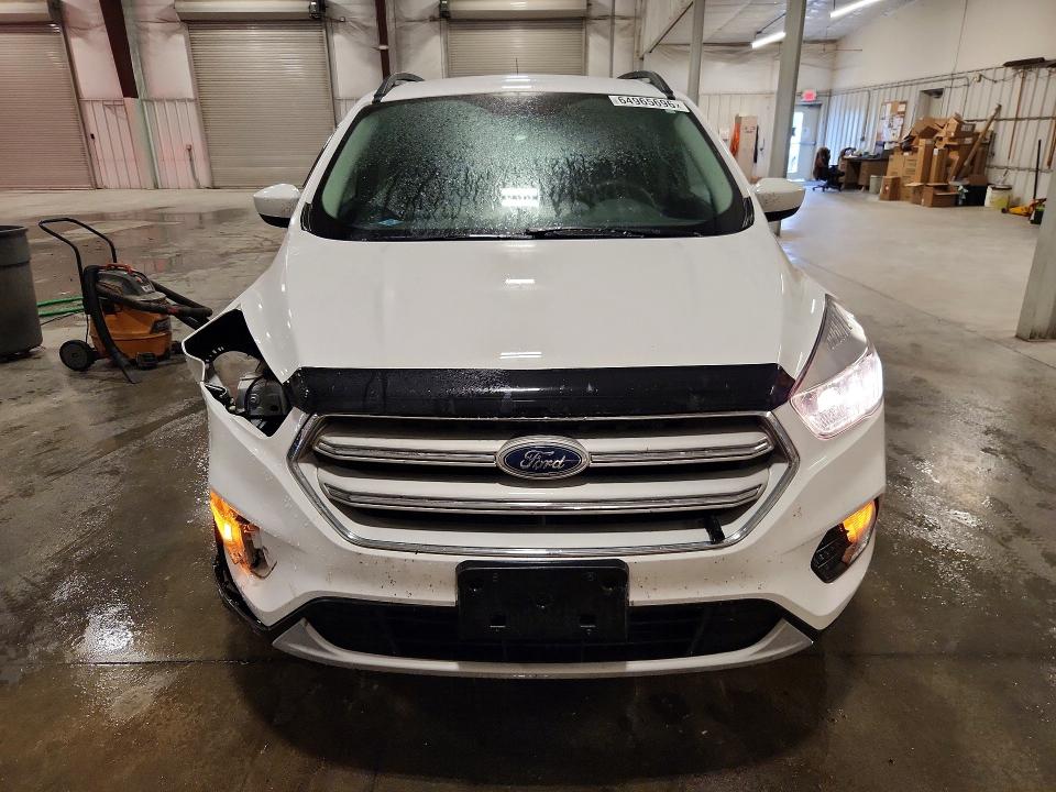 Photo 5 from auction – 2018 FORD ESCAPE with VIN 1FMCU9GD9JUC35579