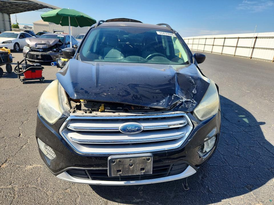 Photo 5 from auction – 2018 FORD ESCAPE with VIN 1FMCU0GD9JUA35443