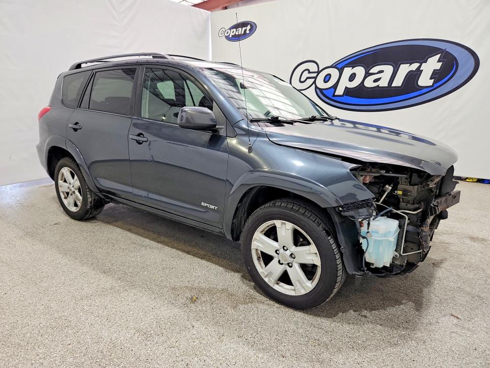 Photo 4 from auction – 2006 TOYOTA RAV4 with VIN JTMZK32V766002992