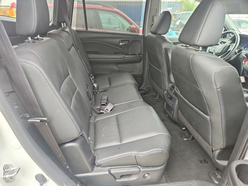 Photo 11 from auction – 2022 HONDA PILOT with VIN 5FNYF6H22NB054984