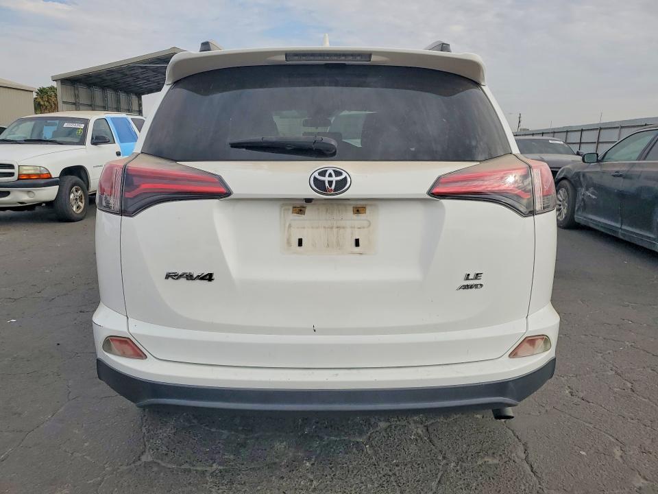 Photo 6 from auction – 2018 TOYOTA RAV4 with VIN JTMBFREVXJJ724628