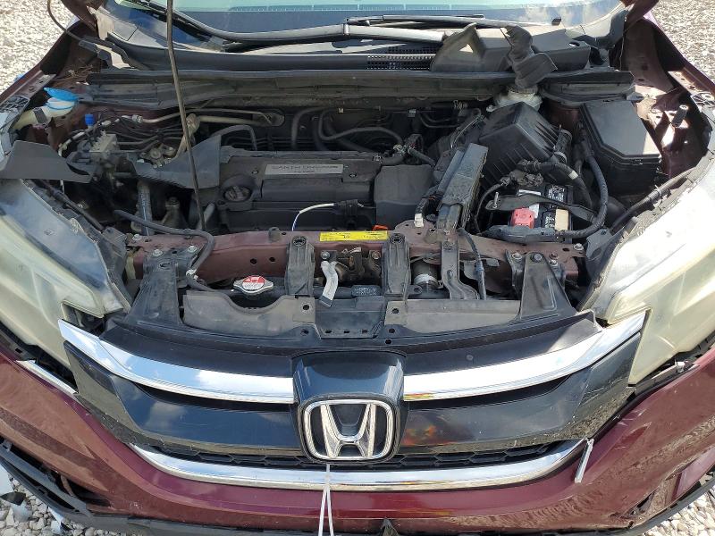 Photo 12 from auction – 2015 HONDA CR-V with VIN 2HKRM3H33FH528493