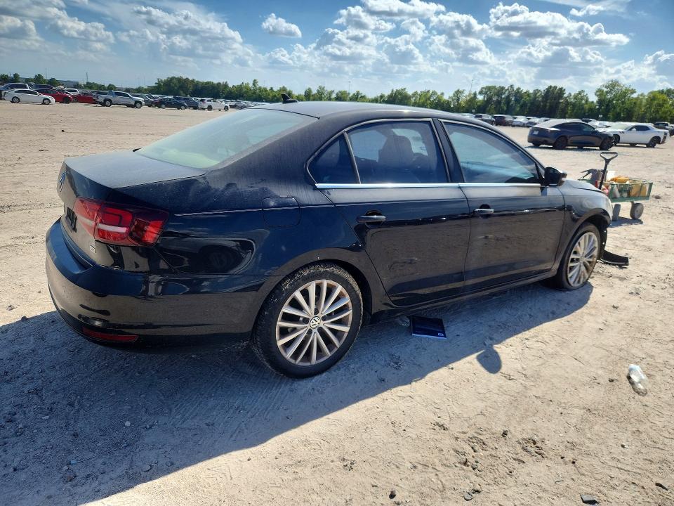 Photo 3 from auction – 2016 VOLKSWAGEN JETTA with VIN 3VWL07AJ9GM238088