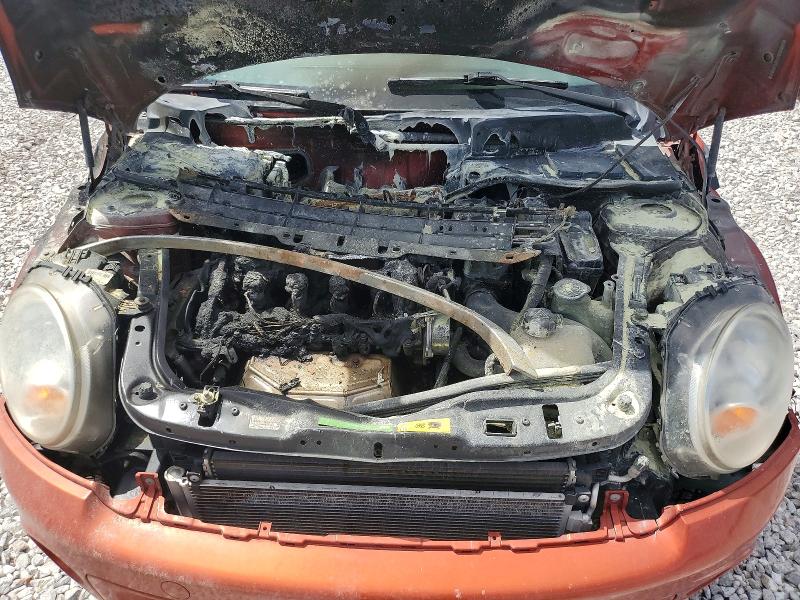Photo 11 from auction – 2011 MINI COOPER with VIN WMWSU3C56BT099220