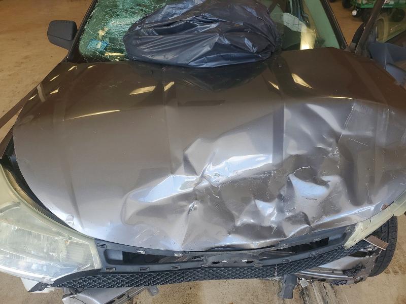 Photo 11 from auction – 2010 FORD FOCUS with VIN 1FAHP3FN8AW219604