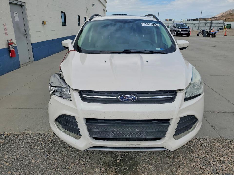 Photo 5 from auction – 2014 FORD ESCAPE with VIN 1FMCU9G99EUC55218
