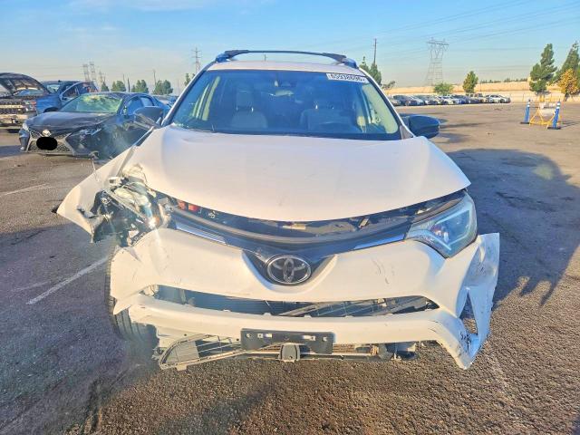 Photo 5 from auction – 2018 TOYOTA RAV4 with VIN JTMZFREVXJJ750936