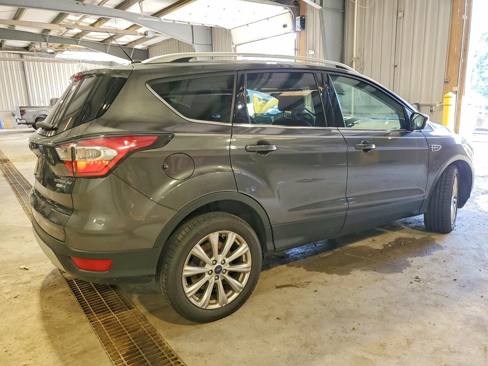 Photo 3 from auction – 2017 FORD ESCAPE with VIN 1FMCU9J97HUB40212