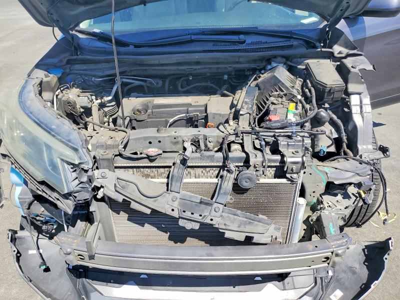 Photo 12 from auction – 2015 HONDA CR-V with VIN 2HKRM3H77FH503292