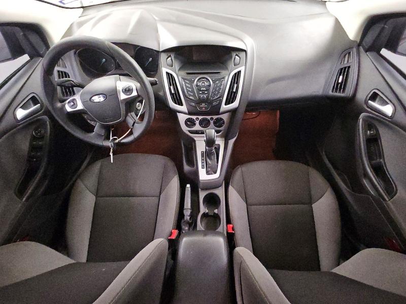 Снимка 8 от търг – 2014 FORD FOCUS с VIN 1FADP3K21EL412808
