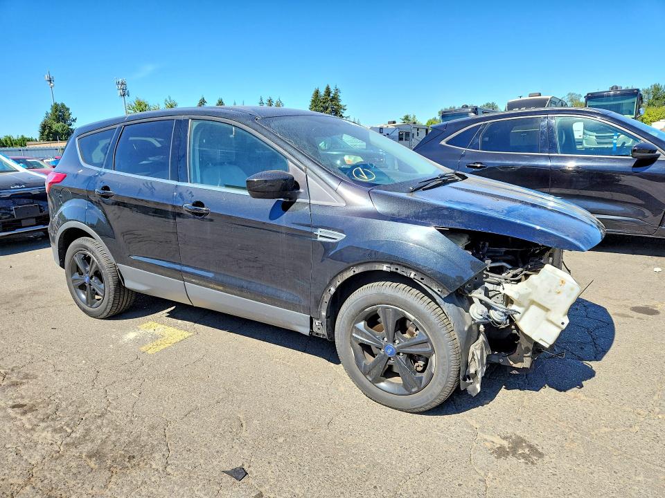 Photo 4 from auction – 2015 FORD ESCAPE with VIN 1FMCU9GX2FUA15900