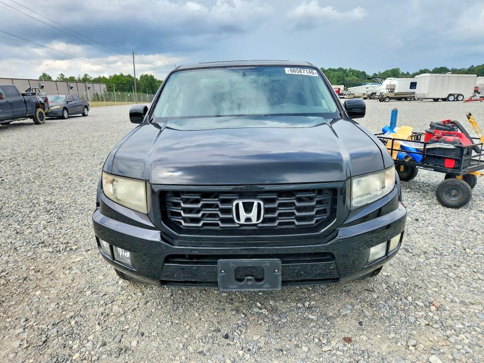 Photo 5 from auction – 2014 HONDA RIDGELINE with VIN 5FPYK1F65EB009016
