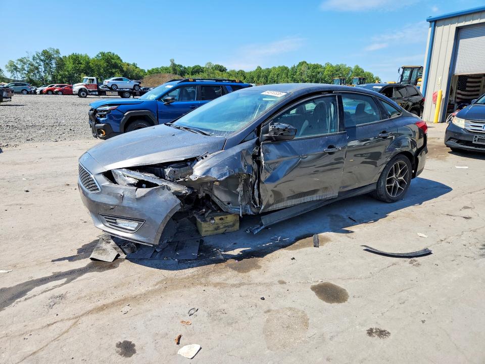 FORD FOCUS 2017 with VIN 1FADP3H26HL316927 - Photo from auction