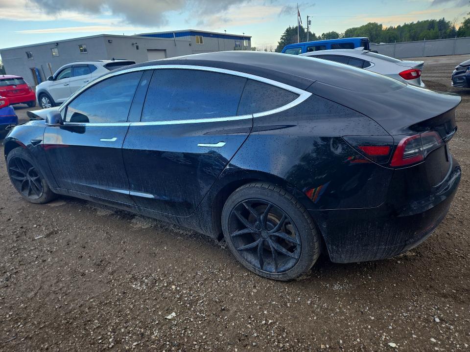 Photo 2 from auction – 2019 TESLA MODEL 3 with VIN 5YJ3E1EBXKF199884