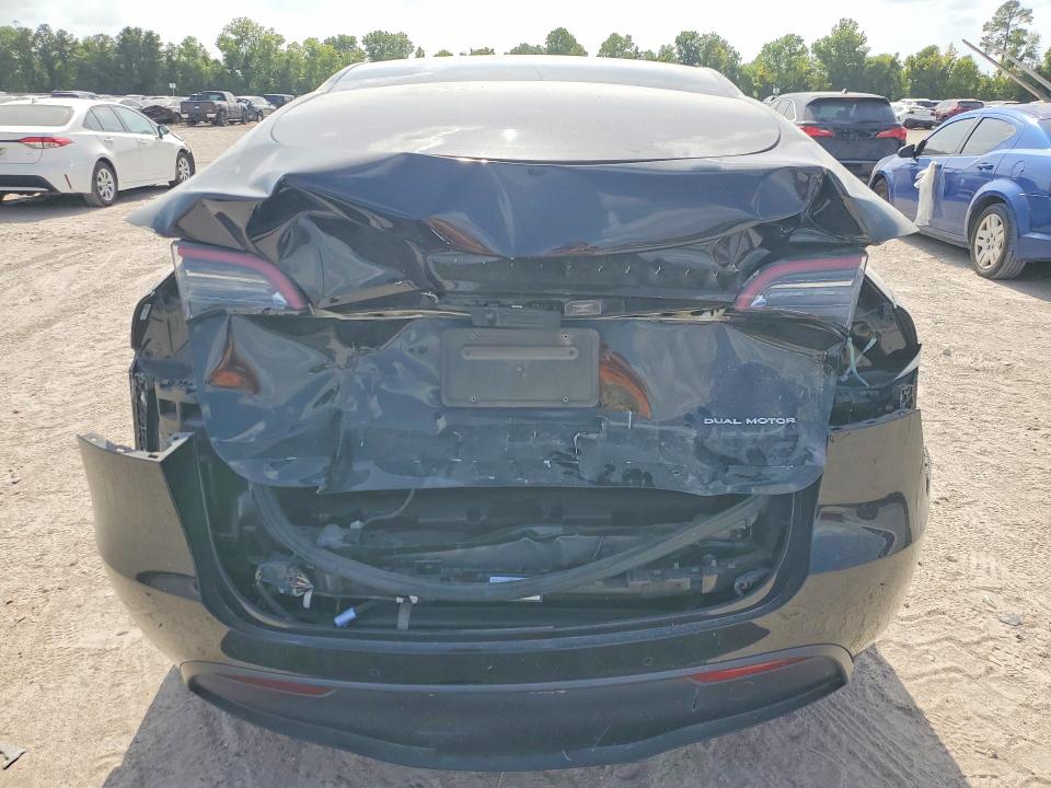 Photo 6 from auction – 2022 TESLA MODEL Y with VIN 7SAYGAEE6NF464656