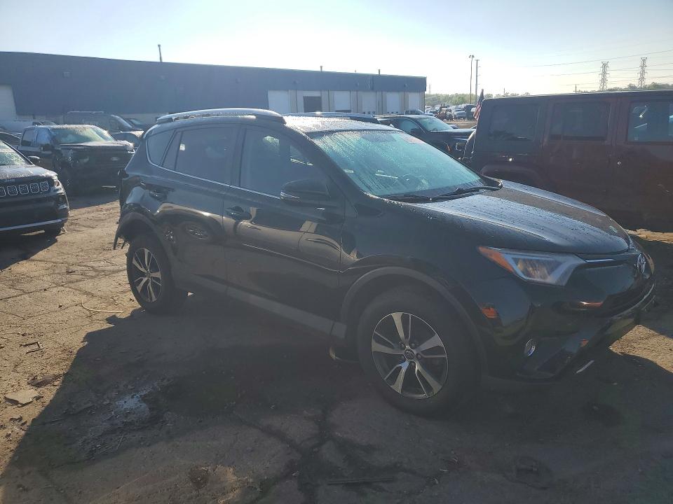 Снимка 4 от търг – 2016 TOYOTA RAV4 с VIN 2T3RFREV6GW449090