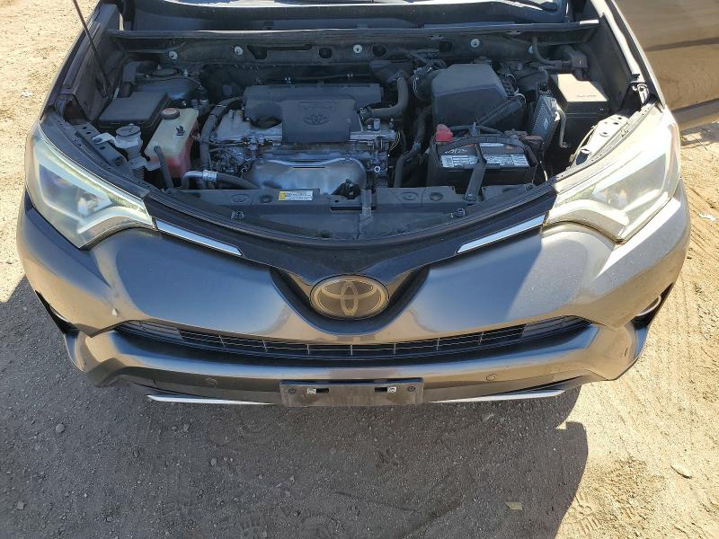 Photo 11 from auction – 2016 TOYOTA RAV4 with VIN JTMYFREV3GD089558
