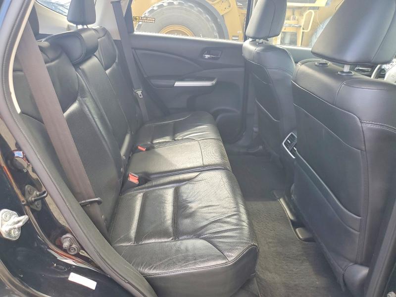 Photo 11 from auction – 2015 HONDA CR-V with VIN 5J6RM4H90FL093304