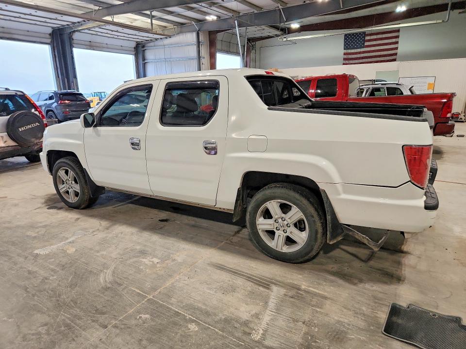 Photo 2 from auction – 2012 HONDA RIDGELINE with VIN 5FPYK1F52CB001699