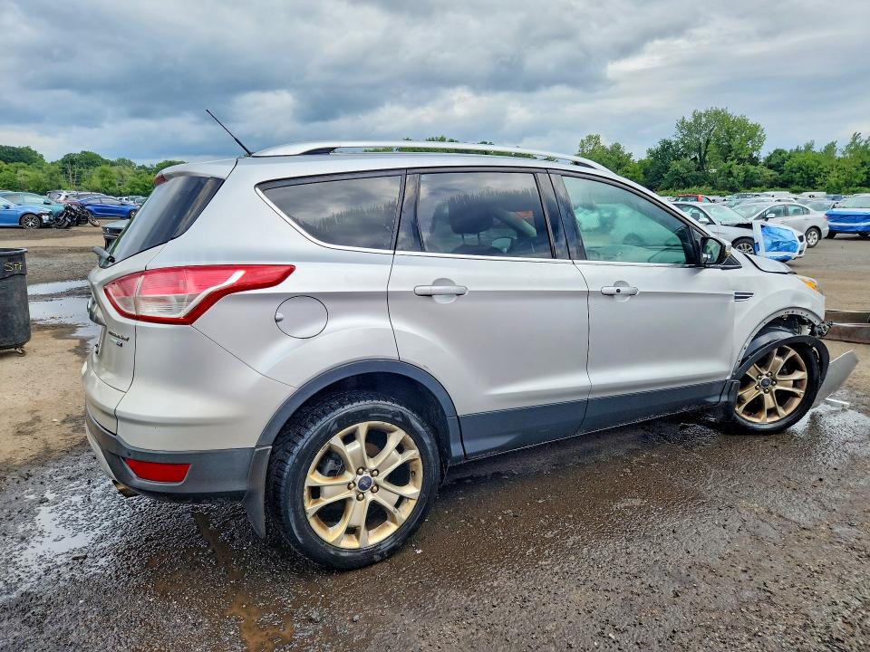 Photo 3 from auction – 2016 FORD ESCAPE with VIN 1FMCU9J92GUA58256