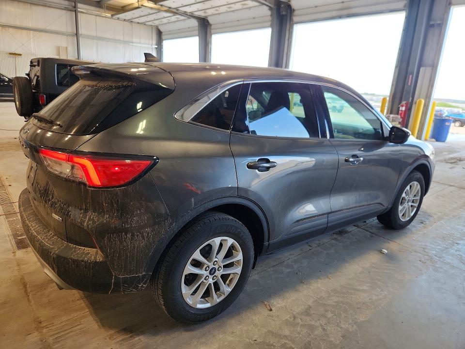 Photo 3 from auction – 2020 FORD ESCAPE with VIN 1FMCU9G62LUC23276