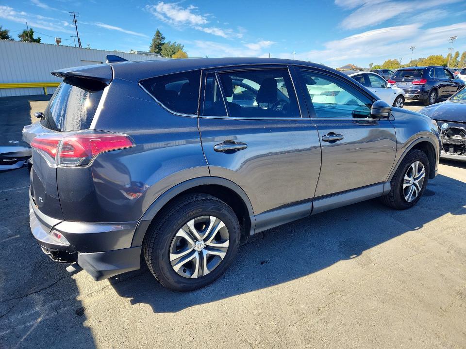 Photo 3 from auction – 2018 TOYOTA RAV4 with VIN 2T3ZFREV9JW494256