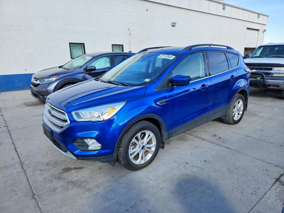 FORD ESCAPE 2018 with VIN 1FMCU9HD1JUD15439 - Photo from auction