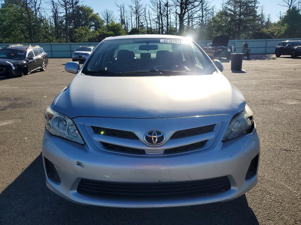 Photo 5 from auction – 2011 TOYOTA COROLLA with VIN JTDBU4EE6BJ091412