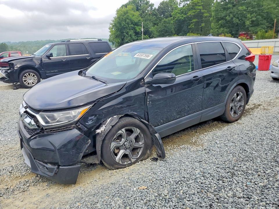 Photo 1 from auction – 2018 HONDA CR-V with VIN 5J6RW1H55JA000612