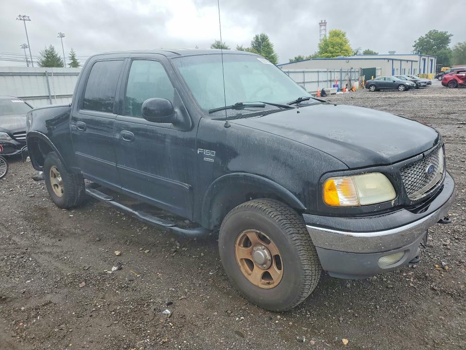 Photo 4 from auction – 2003 FORD F150 with VIN 1FTRW08643KD26228