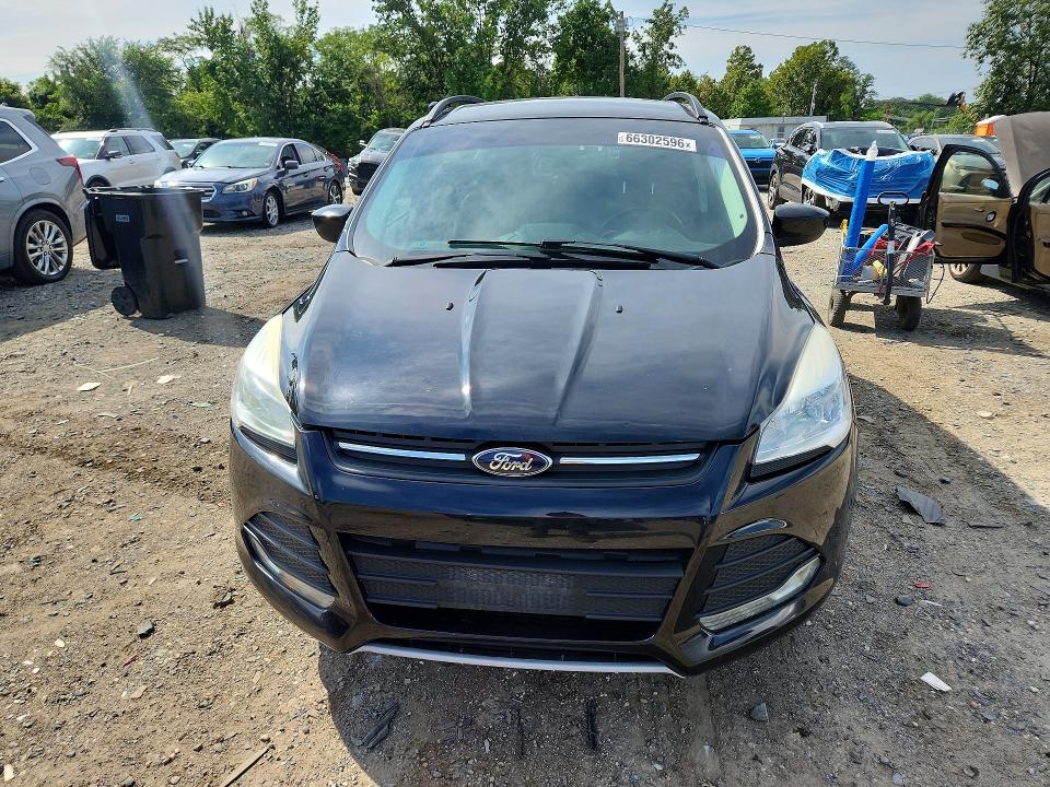 Photo 5 from auction – 2016 FORD ESCAPE with VIN 1FMCU9GX8GUA96161