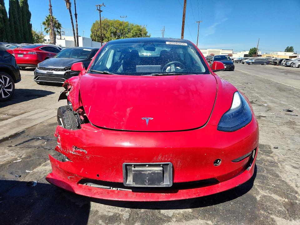 Photo 5 from auction – 2022 TESLA MODEL 3 with VIN 5YJ3E1EA1NF287590