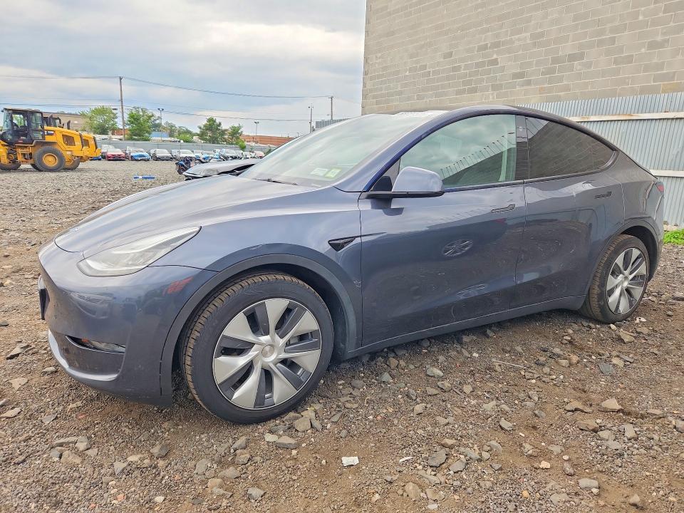 TESLA MODEL Y 2023 z numerem VIN 7SAYGDEE8PA036377 - Zdjęcie z aukcji