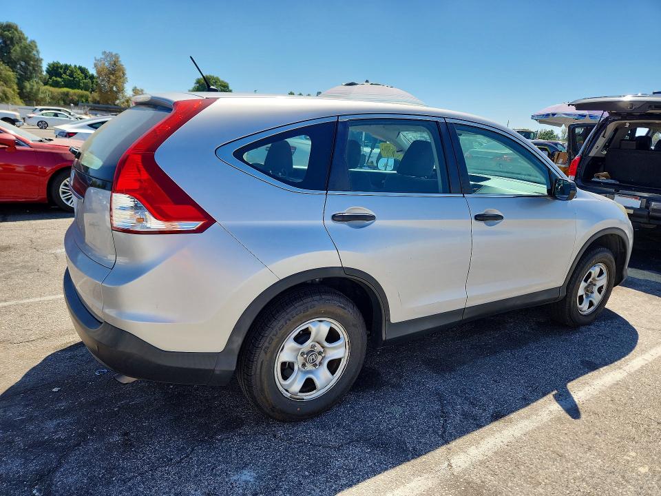 Photo 3 from auction – 2014 HONDA CR-V with VIN 3CZRM3H32EG700448