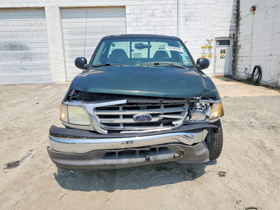 Photo 5 from auction – 2003 FORD F150 with VIN 1FTRF17W33NB71516