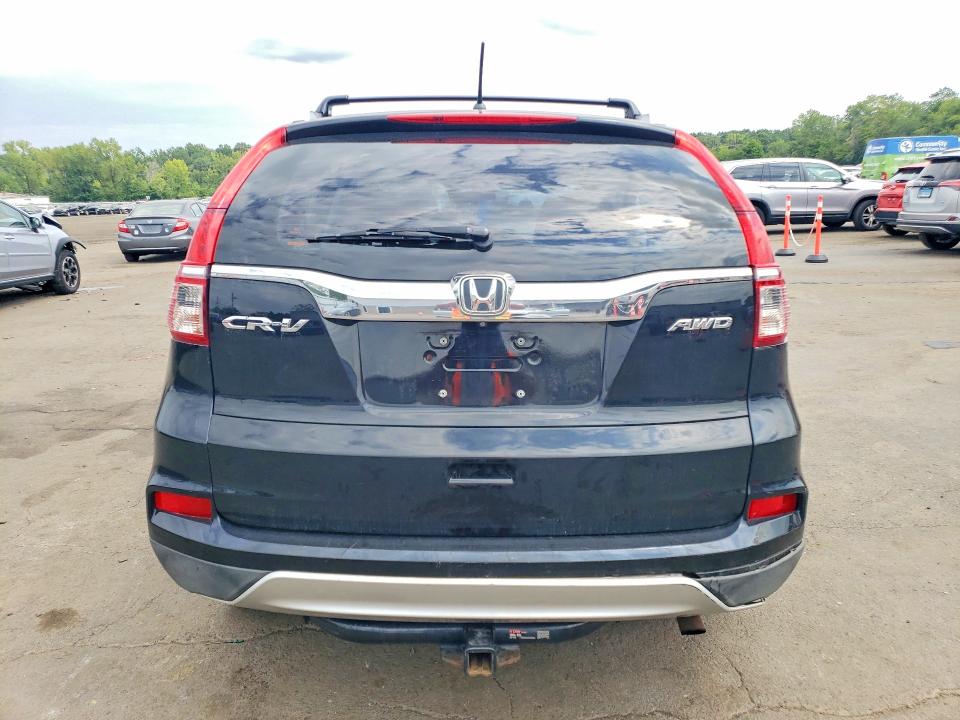 Photo 6 from auction – 2016 HONDA CR-V with VIN 2HKRM4H34GH677597